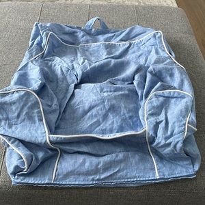 Brand new blue my first anywhere chair cover. Lt blue (chambray)w white piping.